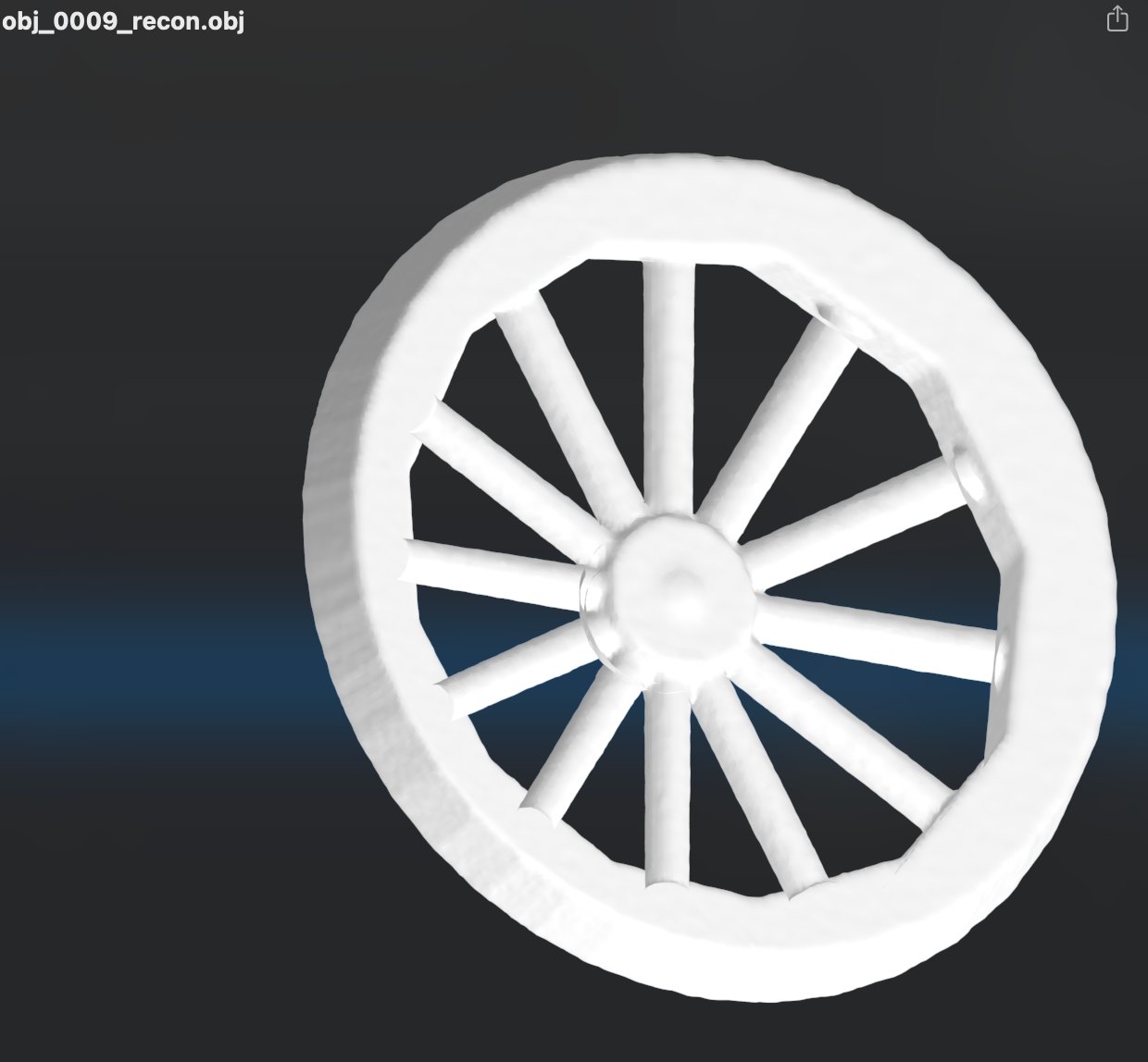 Phase 11 scaled pilot — obj_0009, clean wagon wheel reconstruction