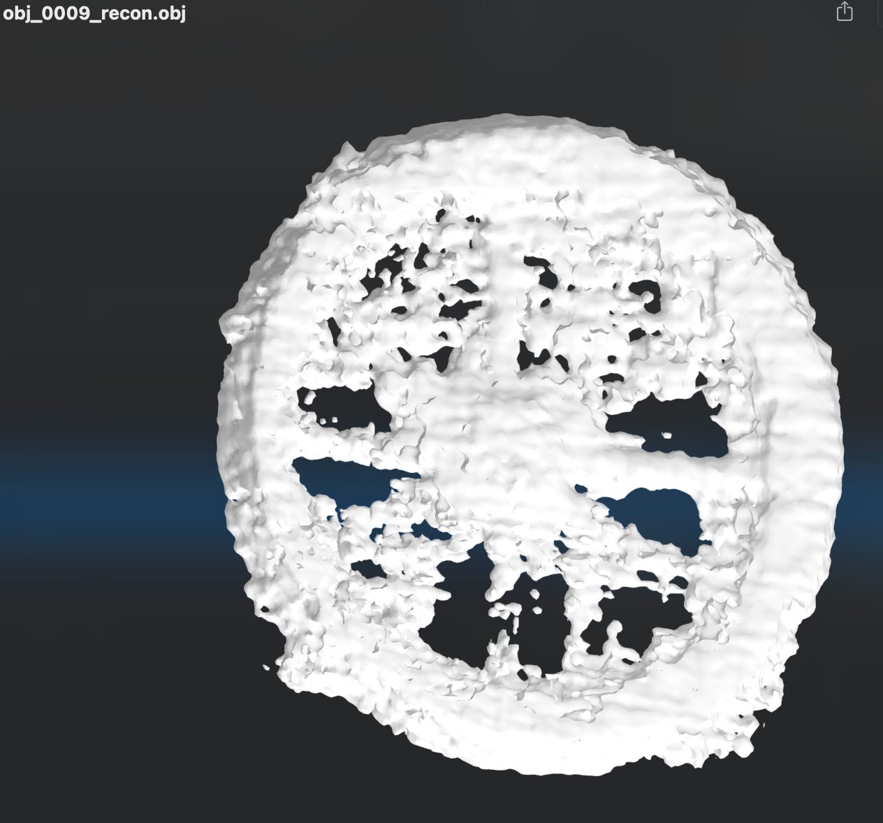 Phase 11 initial pilot — obj_0009, broken pitted sphere